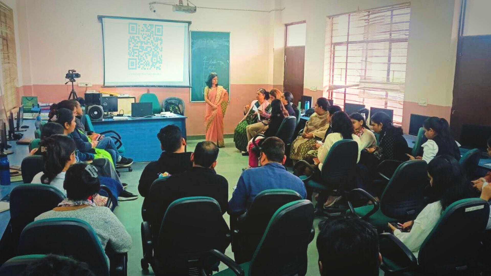 A teacher leading an engaging classroom training session with attentive participants